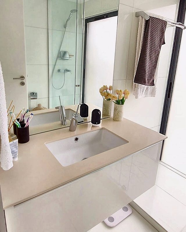 Bathroom with glass shower, washbasin and window